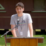 jack zislis speaking at podium