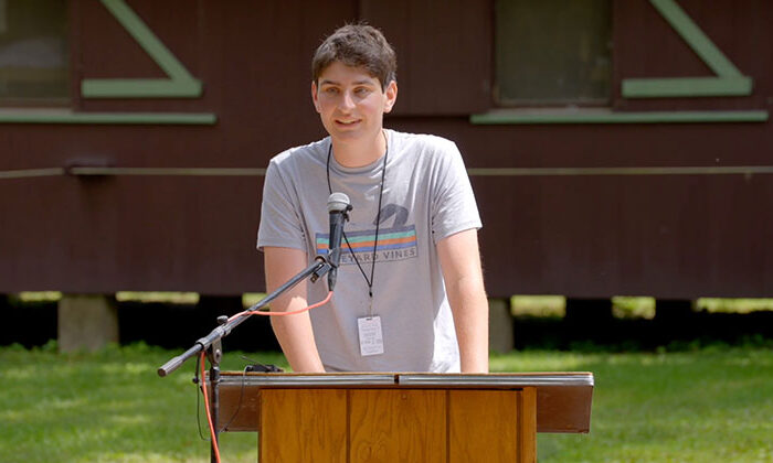 jack zislis speaking at podium